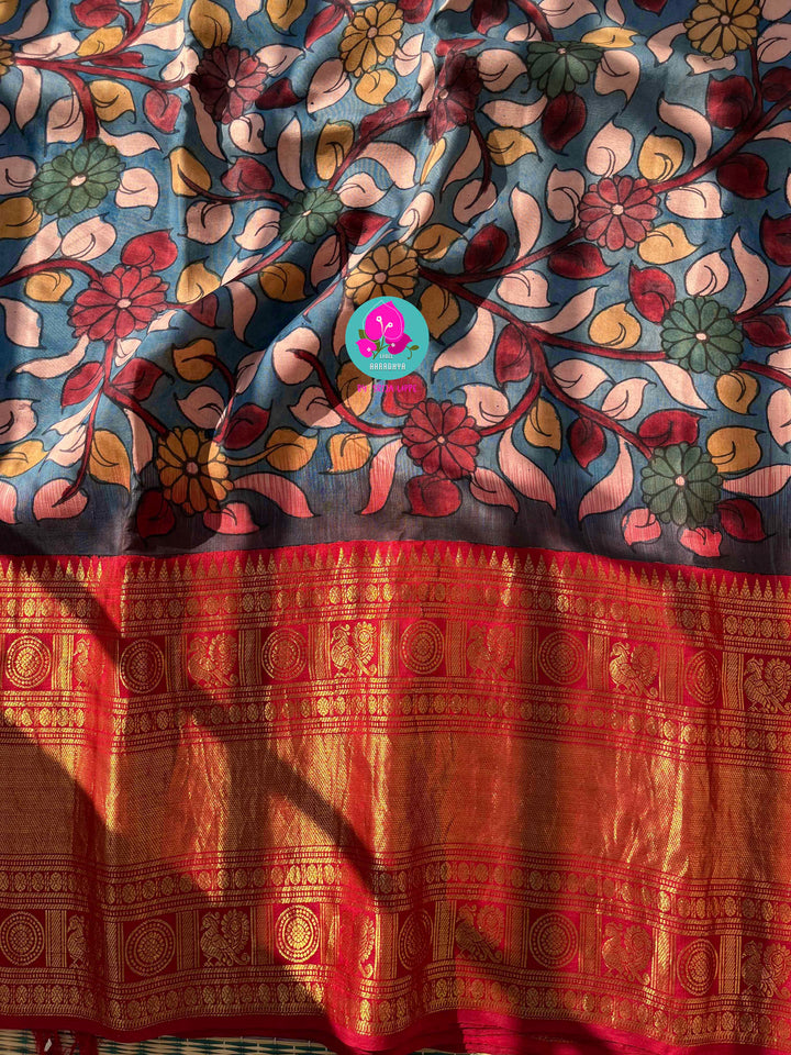 The Painted Epic: Pen Kalamkari & Kanchipattu Fusion Saree in Steel Blue and Crimson