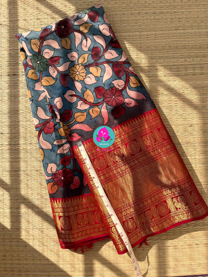 The Painted Epic: Pen Kalamkari & Kanchipattu Fusion Saree in Steel Blue and Crimson
