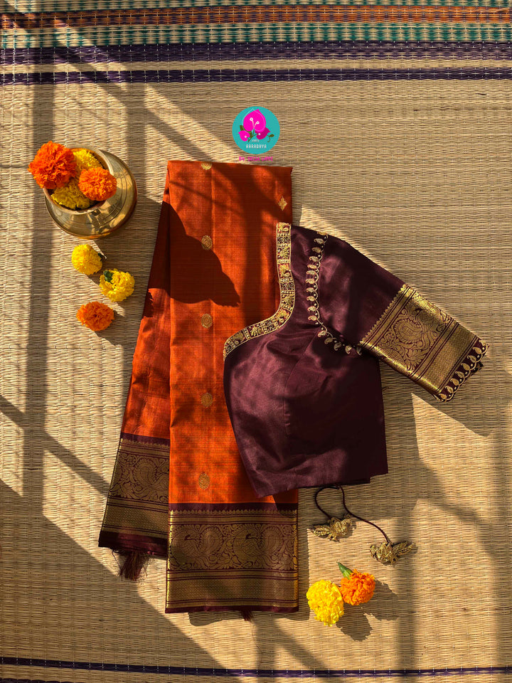 Pure Kanchipattu saree in vintage rust orange and brown border with hand embroidered blouse