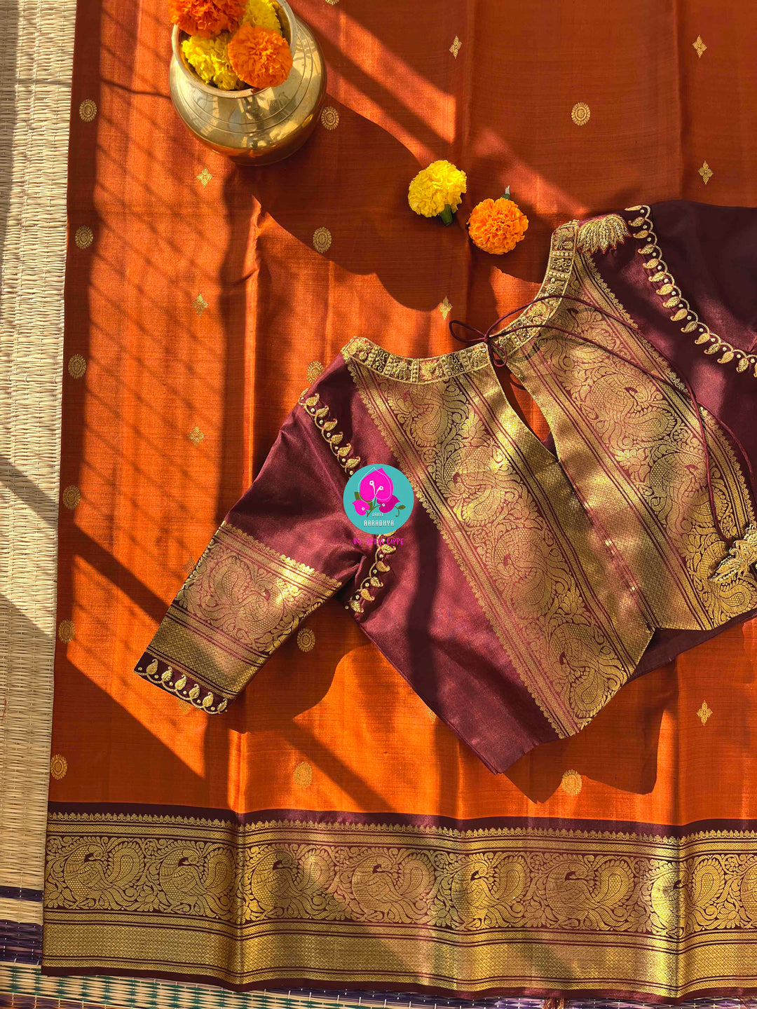 Pure Kanchipattu saree in vintage rust orange and brown border with hand embroidered blouse