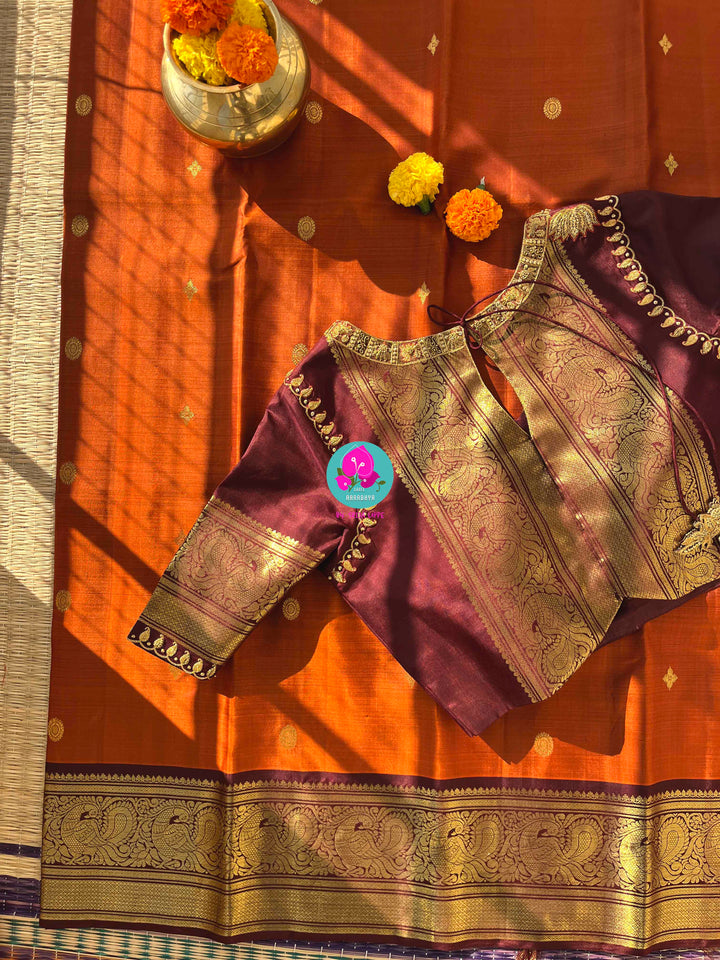 Pure Kanchipattu saree in vintage rust orange and brown border with hand embroidered blouse