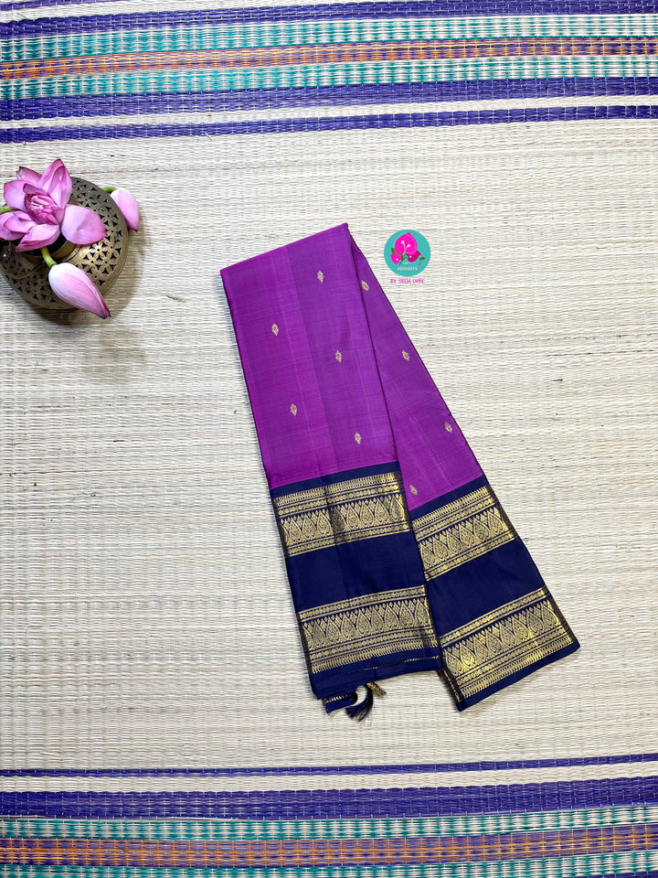 2G zari traditional gap border with luxurious magenta on body and navy blue pallu