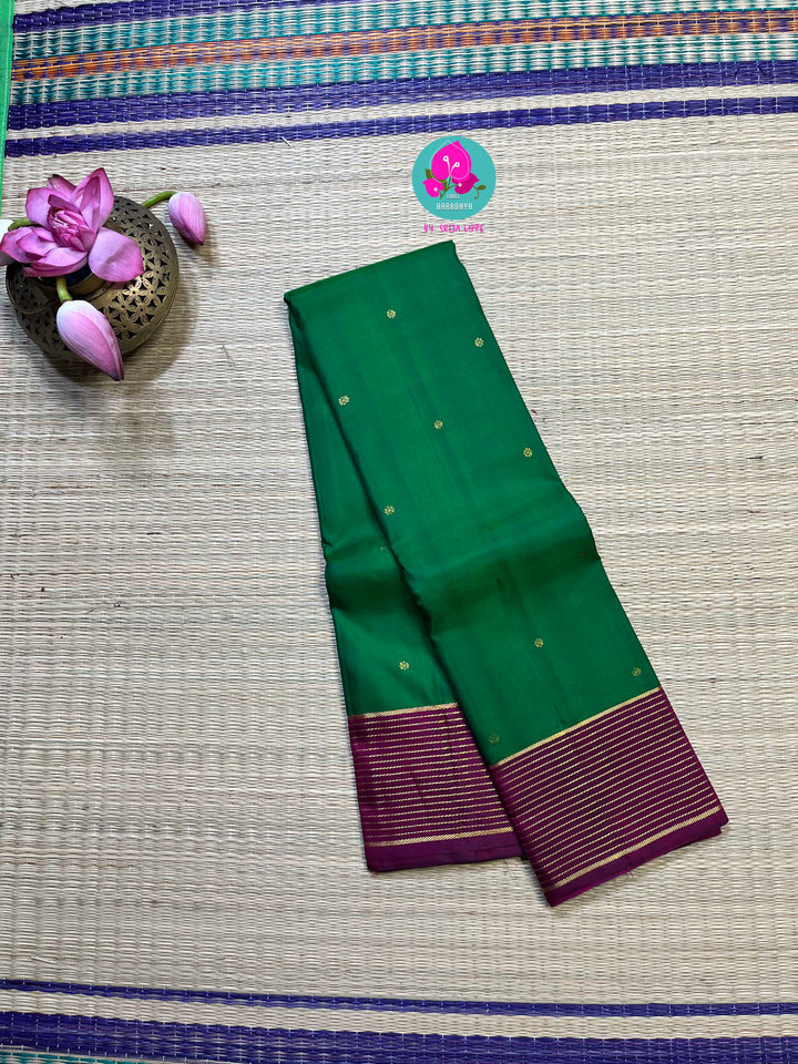 Kanchipattu saree in traditional Green and Magenta