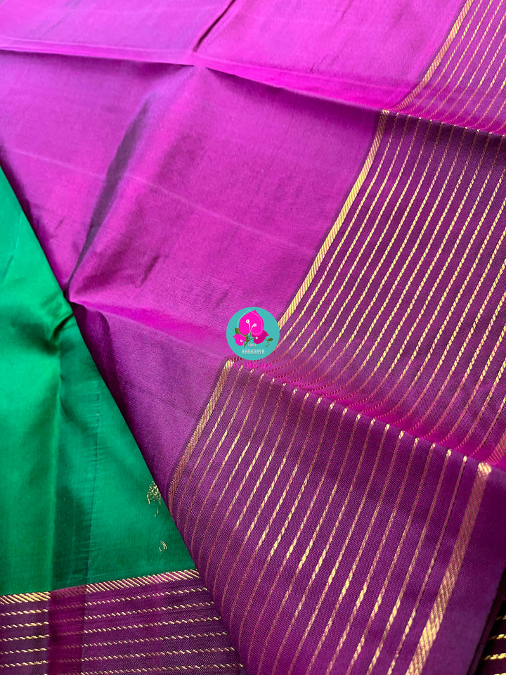 Kanchipattu saree in traditional Green and Magenta