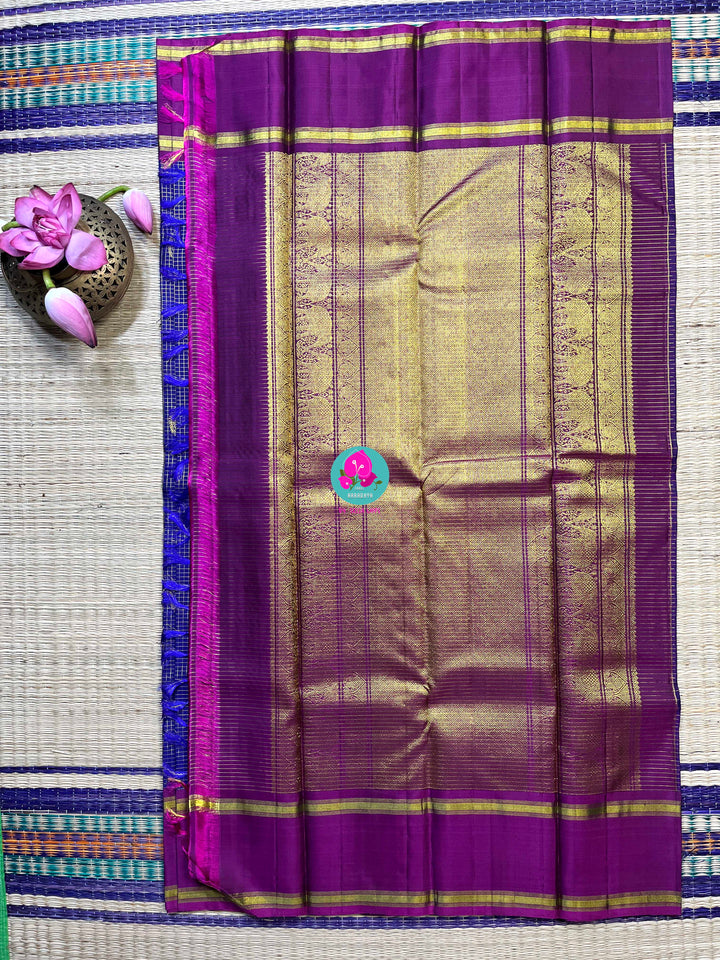 Pure Kanchipattu in Blue color checkered saree with magenta color combination