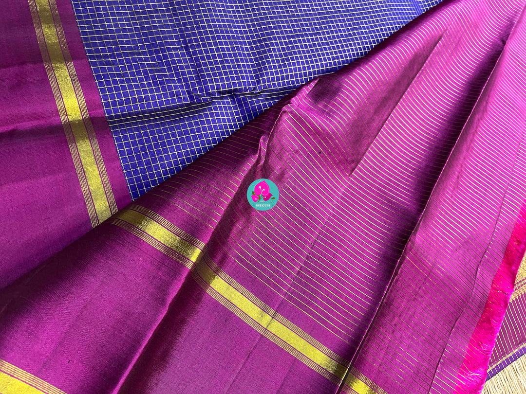 Pure Kanchipattu in Blue color checkered saree with magenta color combination