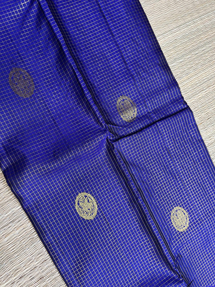 Pure Kanchipattu in Blue color checkered saree with magenta color combination