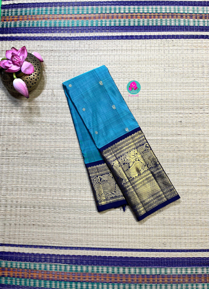 2g zari traditional big border Kanchipattu handloom saree in pastel blue with royal blue