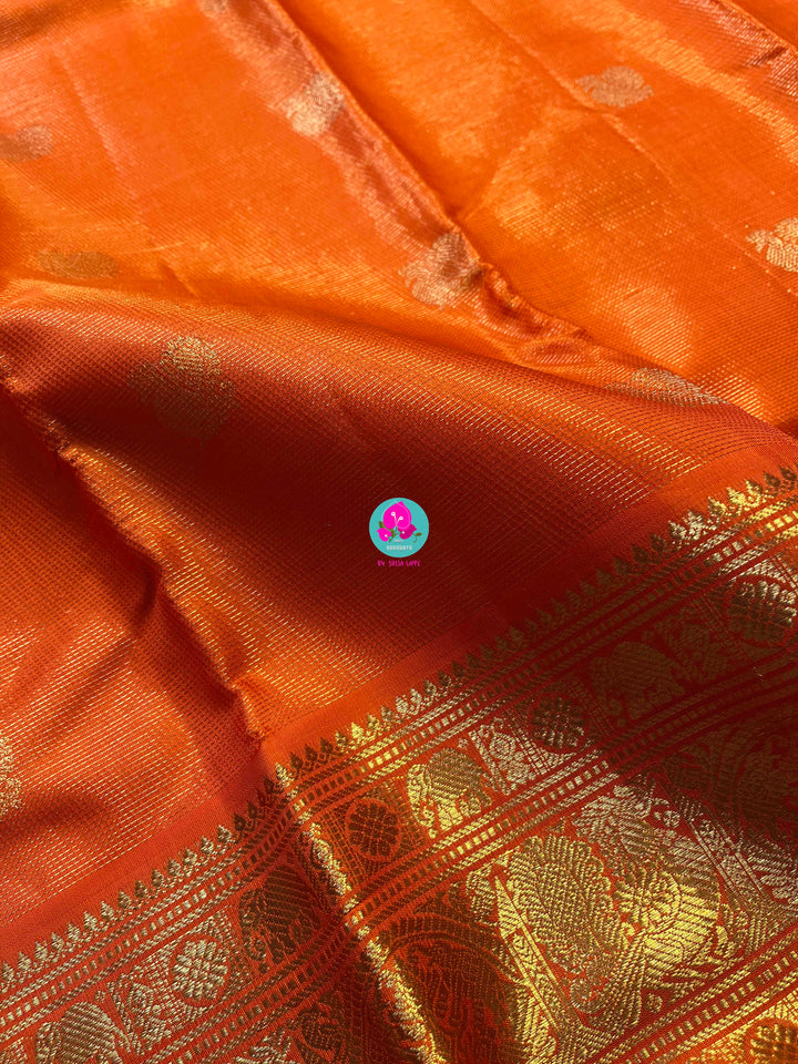 Pure Kanchipattu 3g zari traditional Vaira oosi design on beautiful orange color