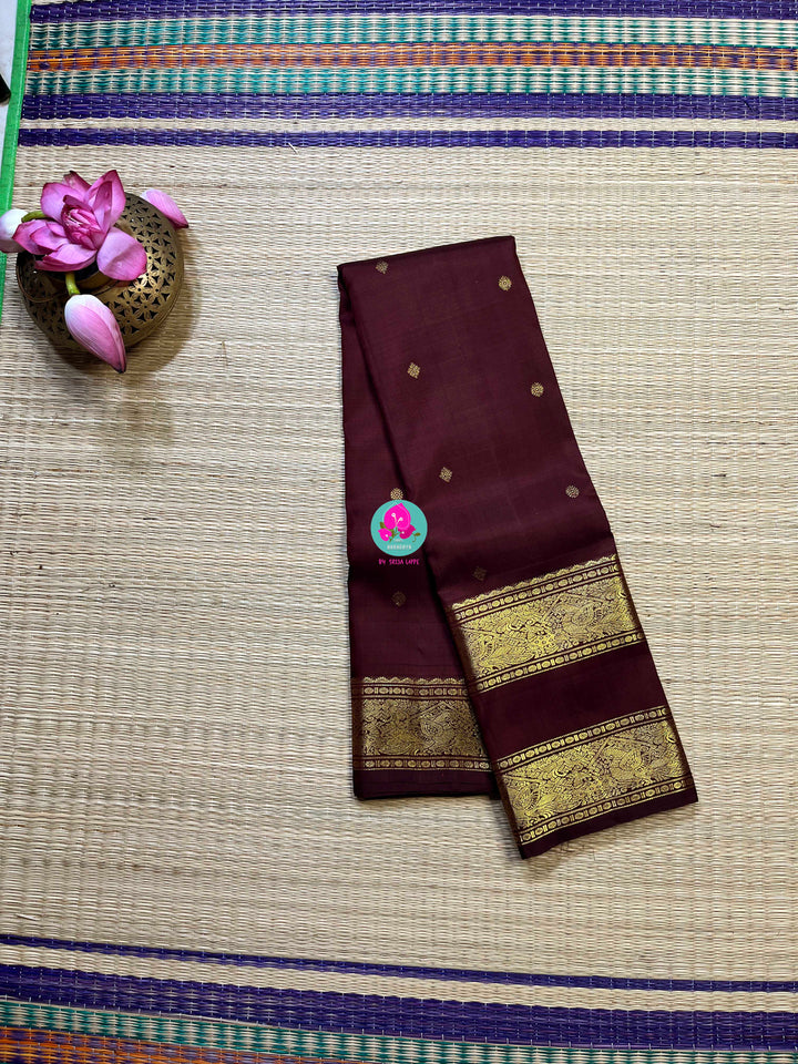 Kanchipuram 2g zari brown vintage saree with gap border