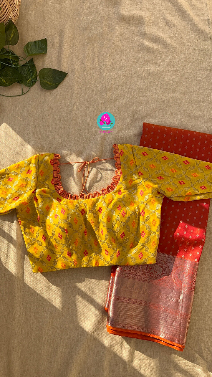 Dark orange silk saree with Bandhani georgette blouse