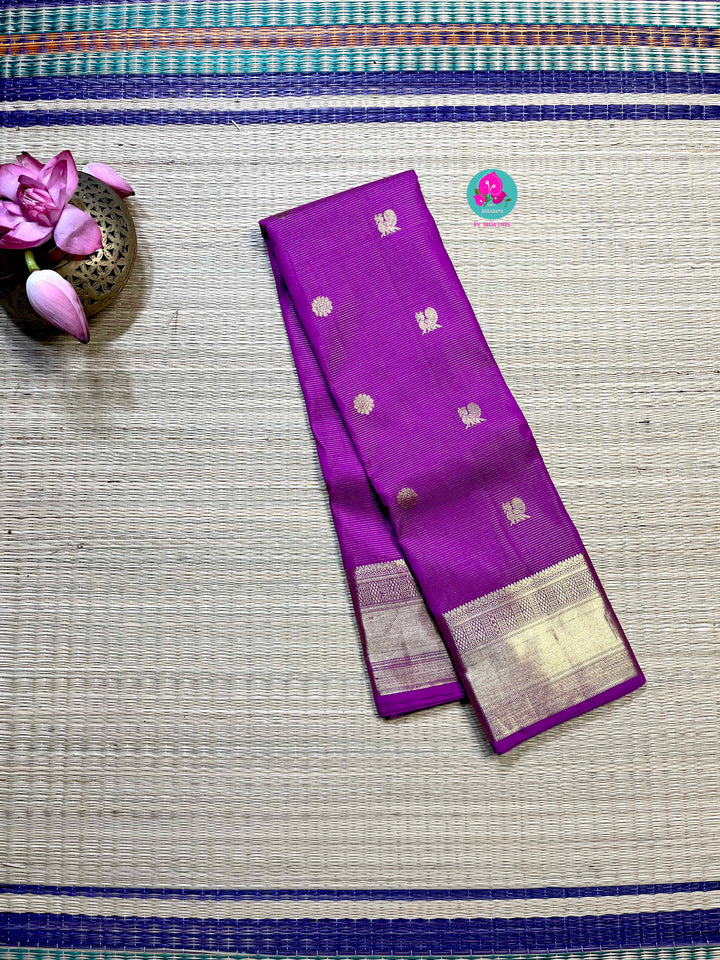 Kanchipattu 1g zari voosi design saree in beautiful shade of magenta