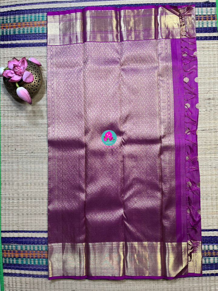 Kanchipattu 1g zari voosi design saree in beautiful shade of magenta