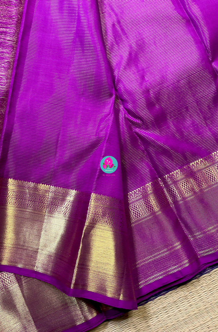 Kanchipattu 1g zari voosi design saree in beautiful shade of magenta