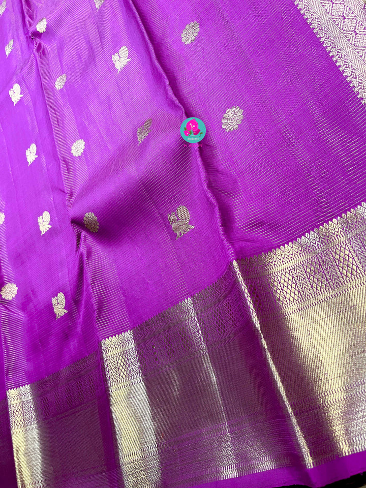 Kanchipattu 1g zari voosi design saree in beautiful shade of magenta