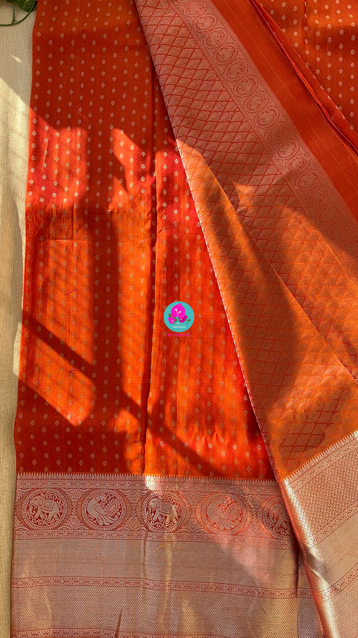 Dark orange silk saree with Bandhani georgette blouse