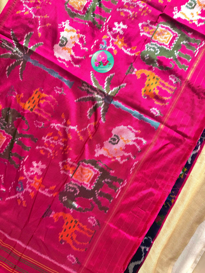 Midnight Blossoms: The Navy Blue & Radiant Pink Pure Silk Ikkat Symphony