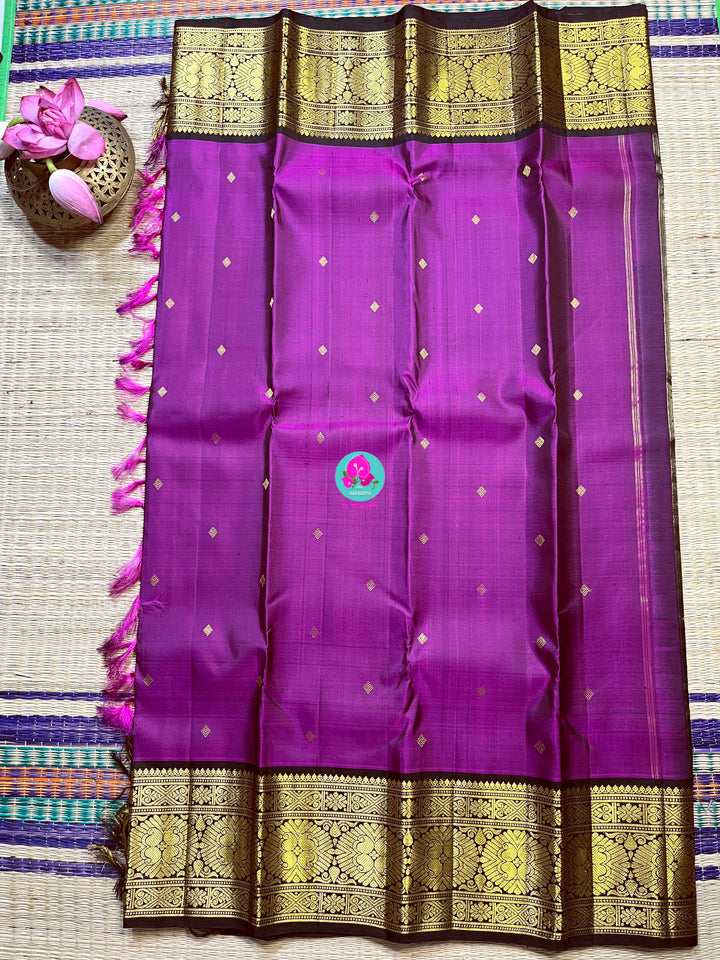 2G deep Kanchipattu handloom saree in the shade of purplish magenta