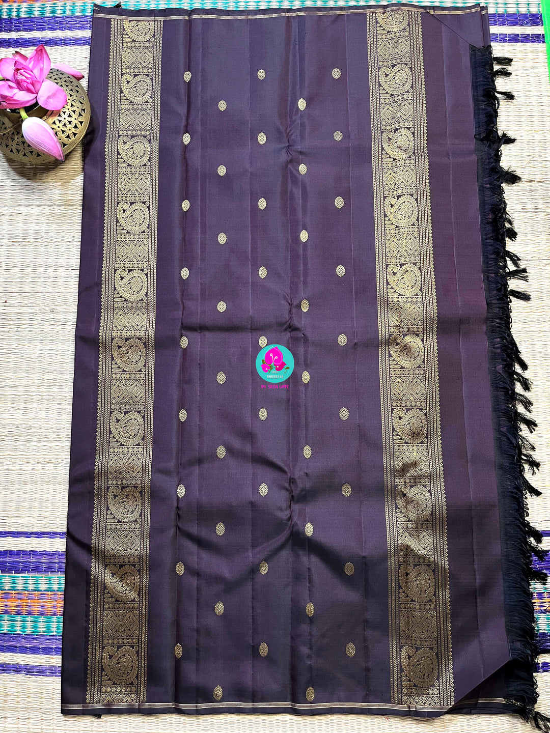 Kanchipattu handloom zari Nandhini motifs all over the saree, on a classy shade brown