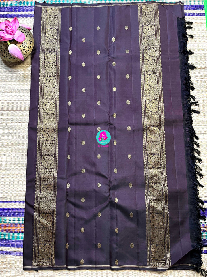 Kanchipattu handloom zari Nandhini motifs all over the saree, on a classy shade brown