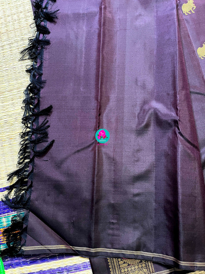 Kanchipattu handloom zari Nandhini motifs all over the saree, on a classy shade brown