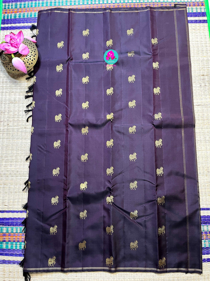 Kanchipattu handloom zari Nandhini motifs all over the saree, on a classy shade brown