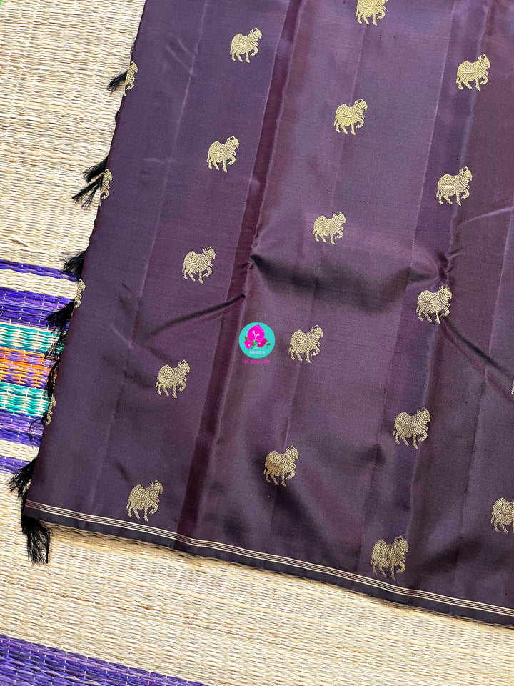 Kanchipattu handloom zari Nandhini motifs all over the saree, on a classy shade brown