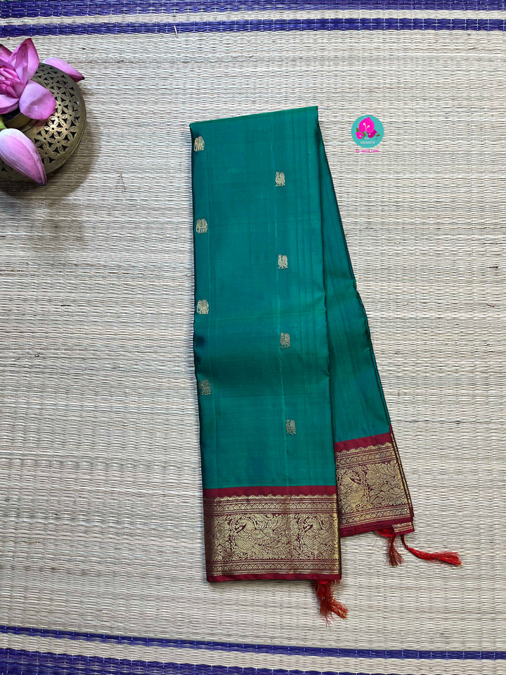 Pure Kanchipattu handloom in peacock green and red