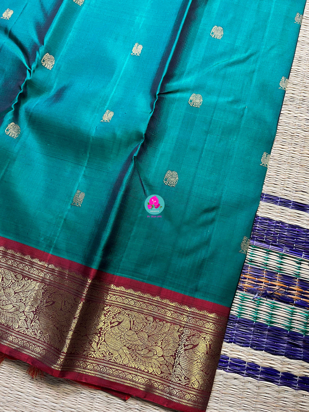 Pure Kanchipattu handloom in peacock green and red
