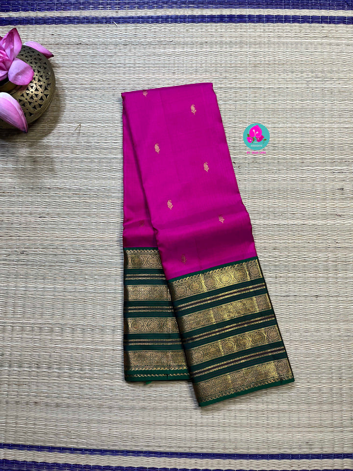 2g zari traditional border in pink and green combination is the perfect vintage contrast