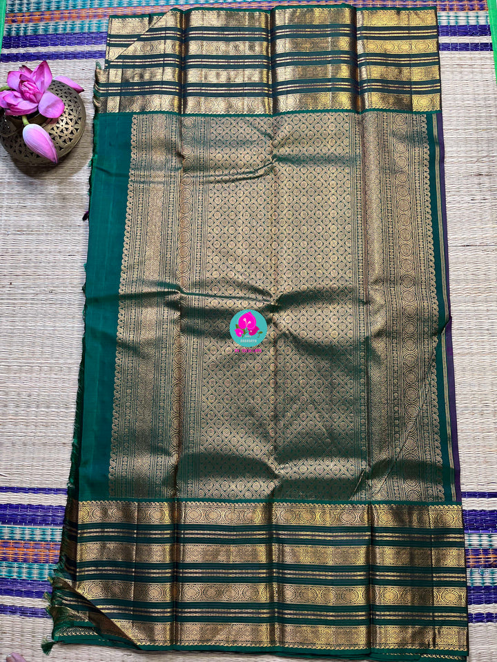 2g zari traditional border in pink and green combination is the perfect vintage contrast