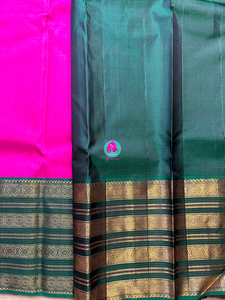 2g zari traditional border in pink and green combination is the perfect vintage contrast