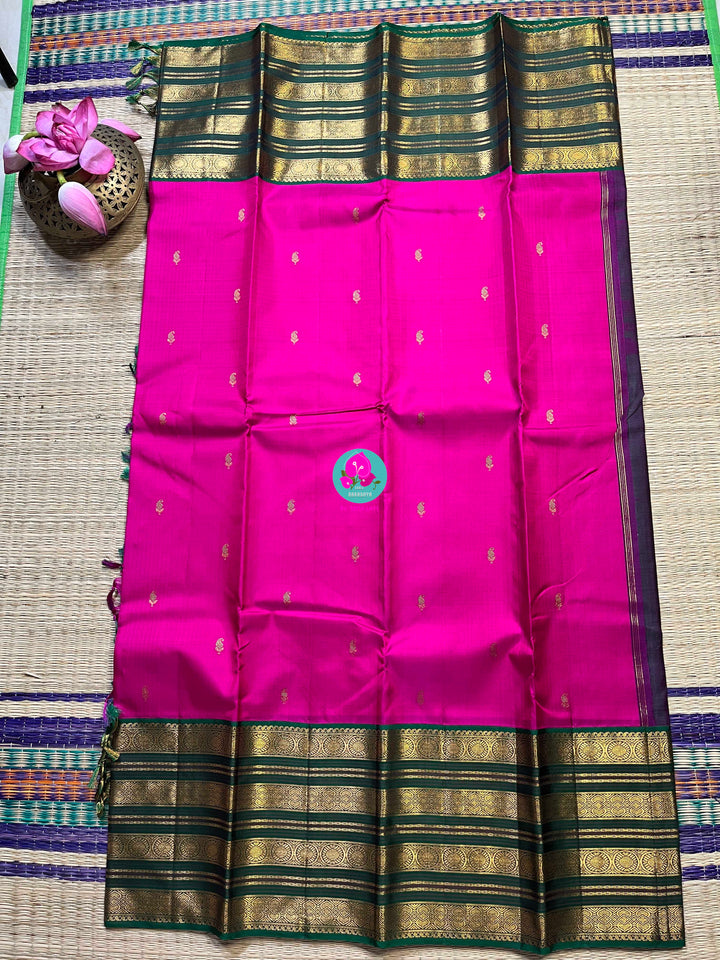 2g zari traditional border in pink and green combination is the perfect vintage contrast