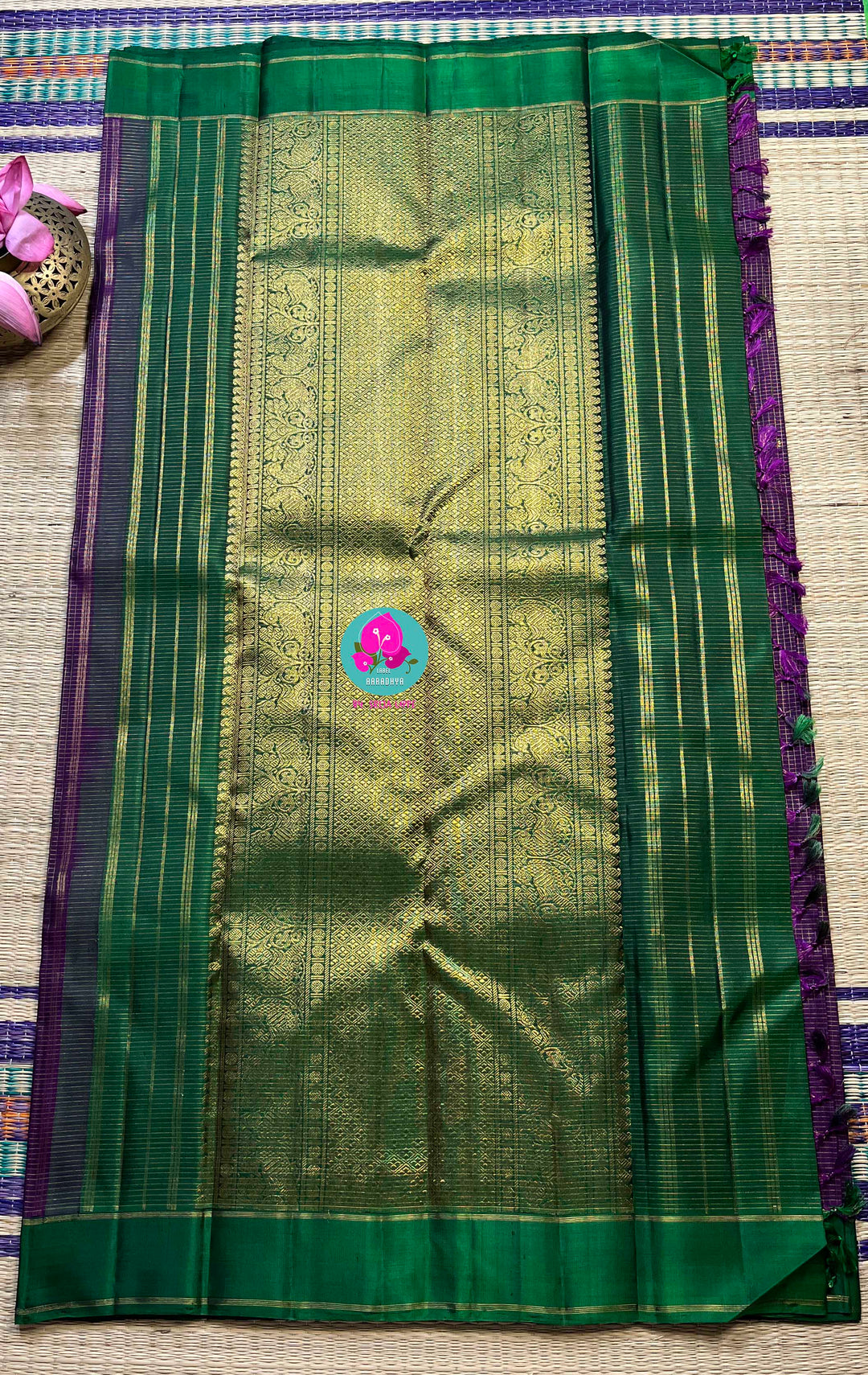 Pure zari purple saree with green constrast gap border