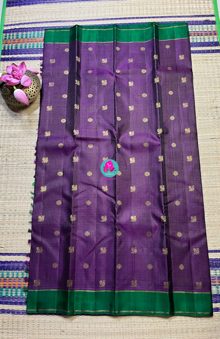 Pure zari purple saree with green constrast gap border