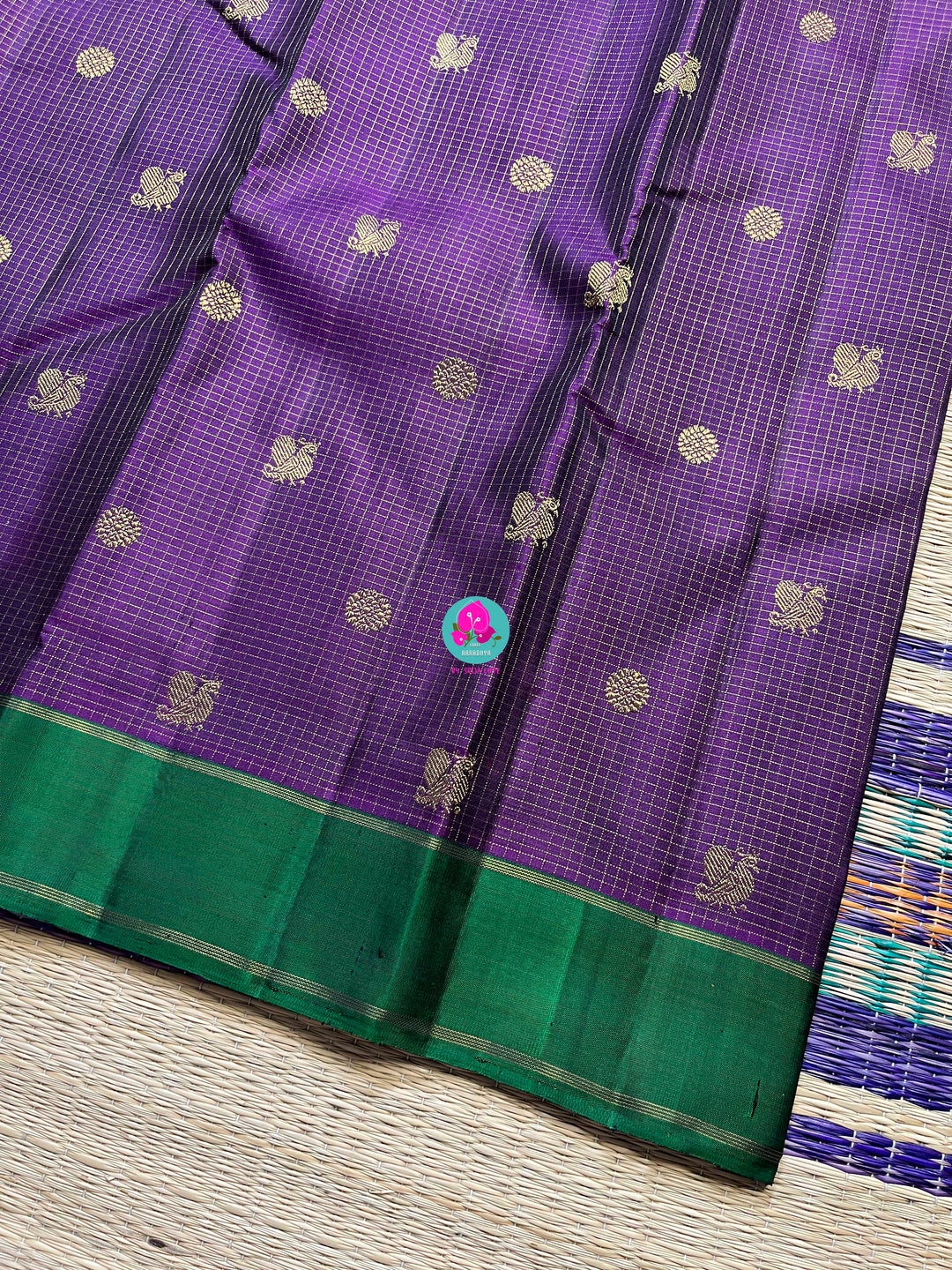 Pure zari purple saree with green constrast gap border