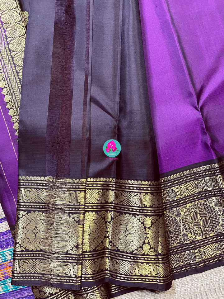 Beautiful purple shaded Kanchipattu Saree with contrast brown border