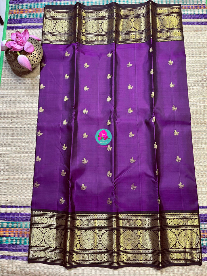 Beautiful purple shaded Kanchipattu Saree with contrast brown border