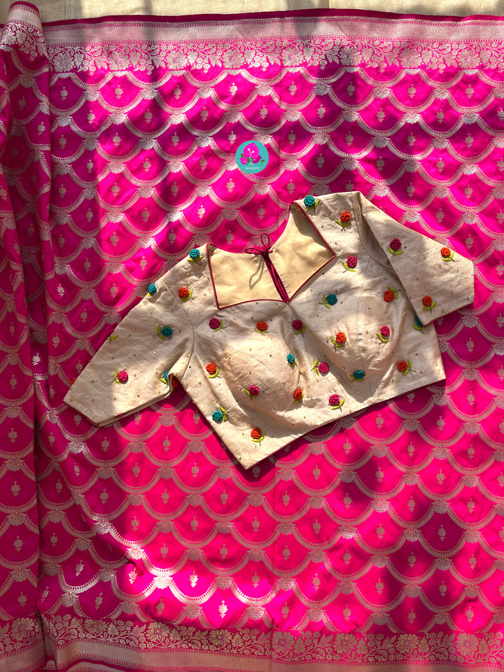 Semi Banarasi Silk Saree paired with pure tissue rawsilk blouse embroidered with rose knot
