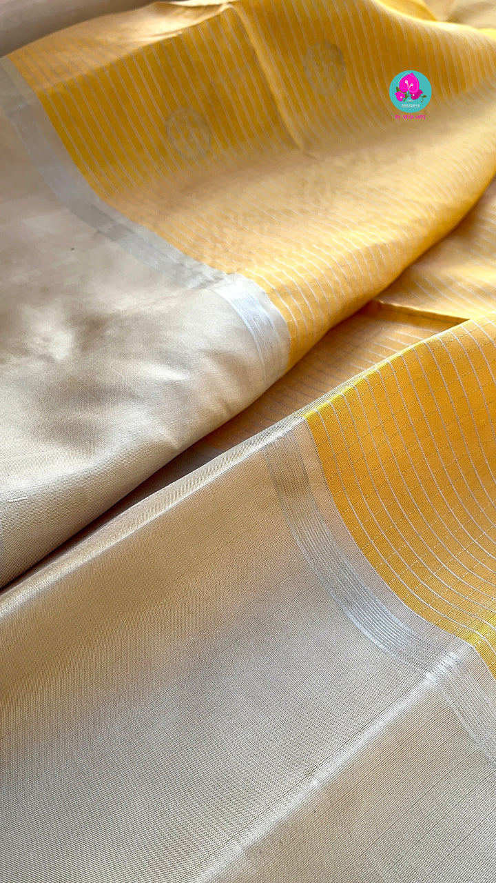 Yellow pure soft silk saree with squirrel grey blouse