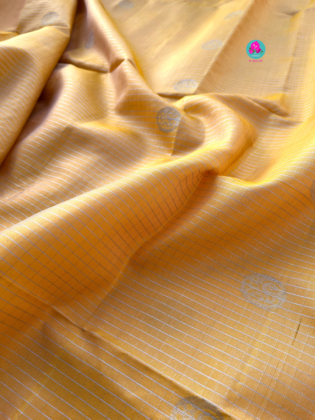 Yellow pure soft silk saree with squirrel grey blouse