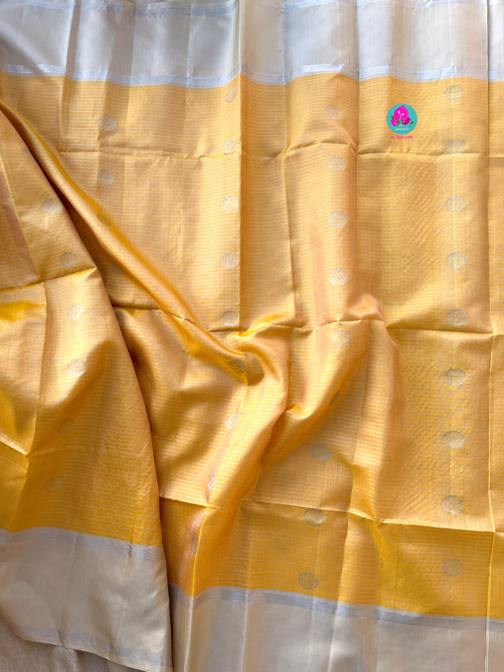 Yellow pure soft silk saree with squirrel grey blouse