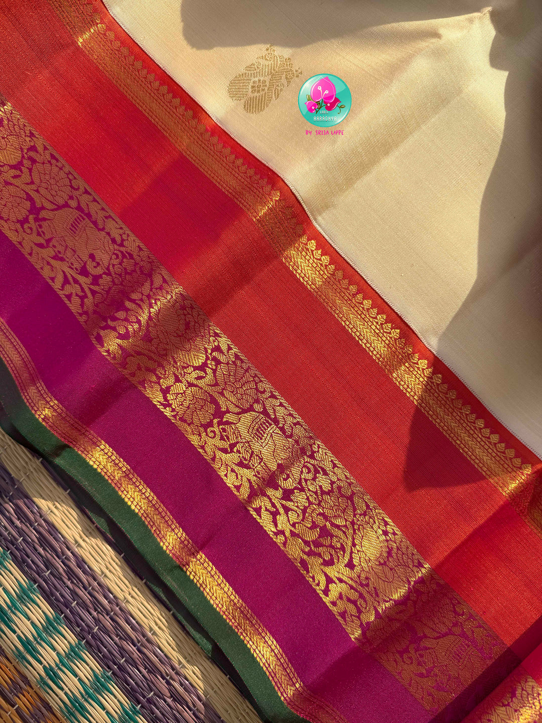 Celestial Ivory: The Pure Handloom Kanjivaram with Surya-Chandrulu Artistry