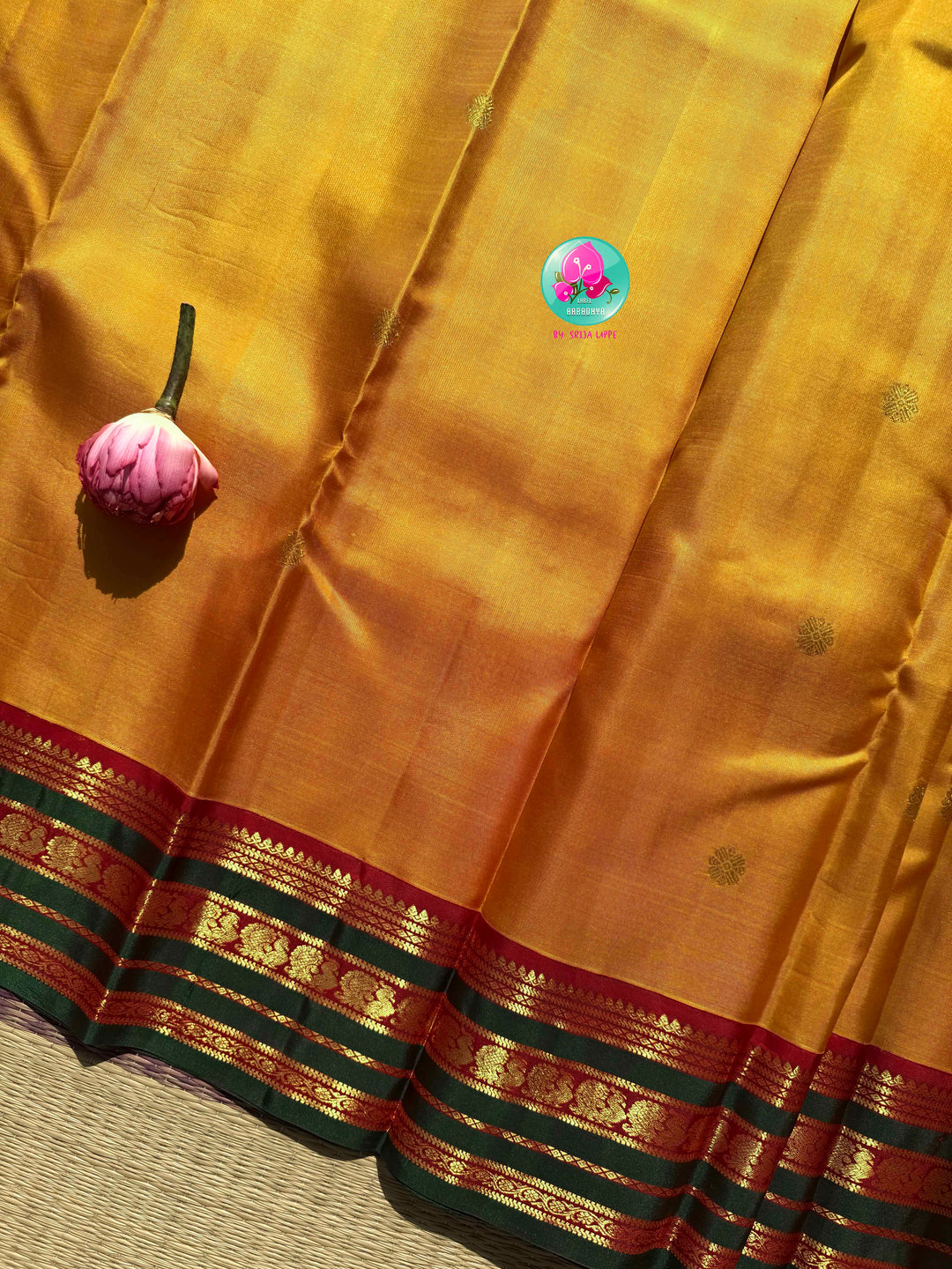 Gilded Sunshine: The Mustard Yellow Kanjeevaram & Emerald Tanjore Masterpiece
