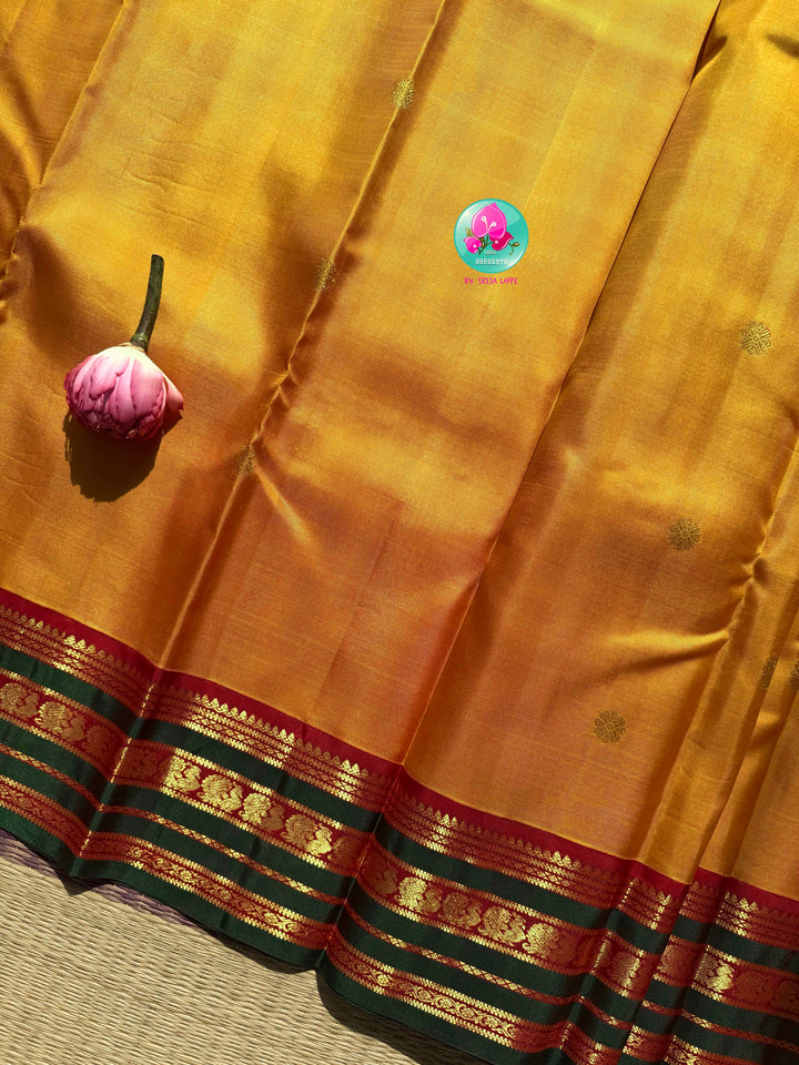 Gilded Sunshine: The Mustard Yellow Kanjeevaram & Emerald Tanjore Masterpiece