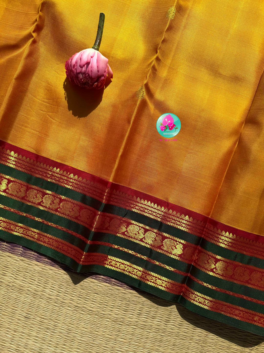 Gilded Sunshine: The Mustard Yellow Kanjeevaram & Emerald Tanjore Masterpiece