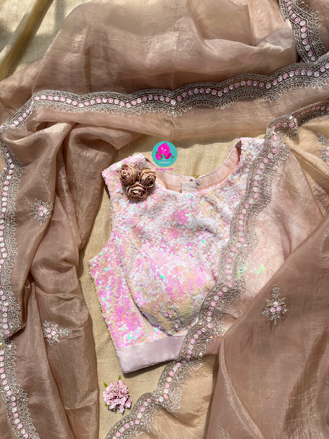 Hand embroidered Organza saree Paired with Sequins blouse