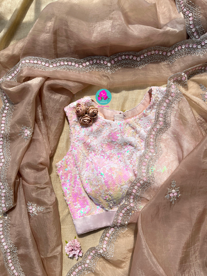 Hand embroidered Organza saree Paired with Sequins blouse