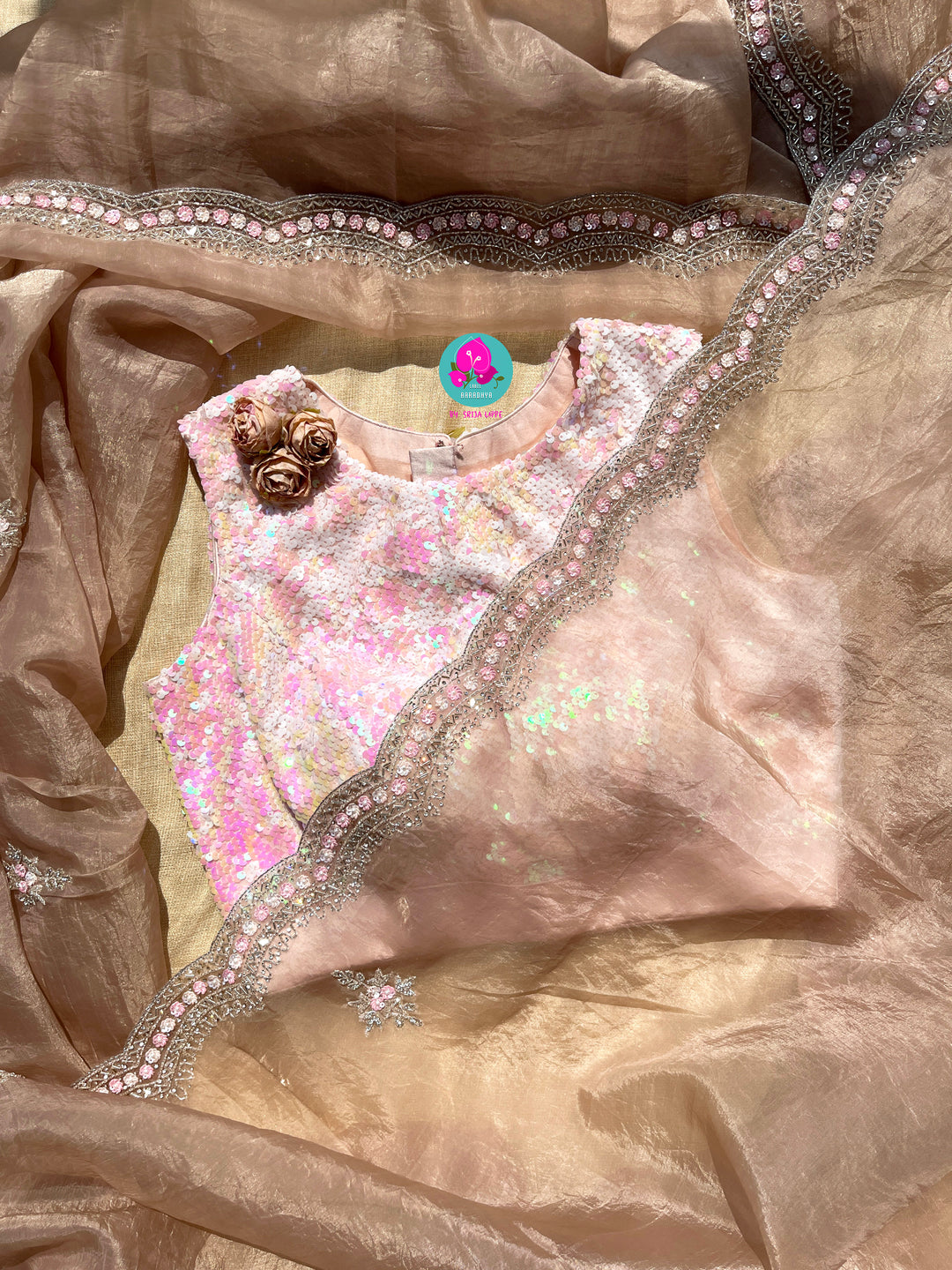 Hand embroidered Organza saree Paired with Sequins blouse