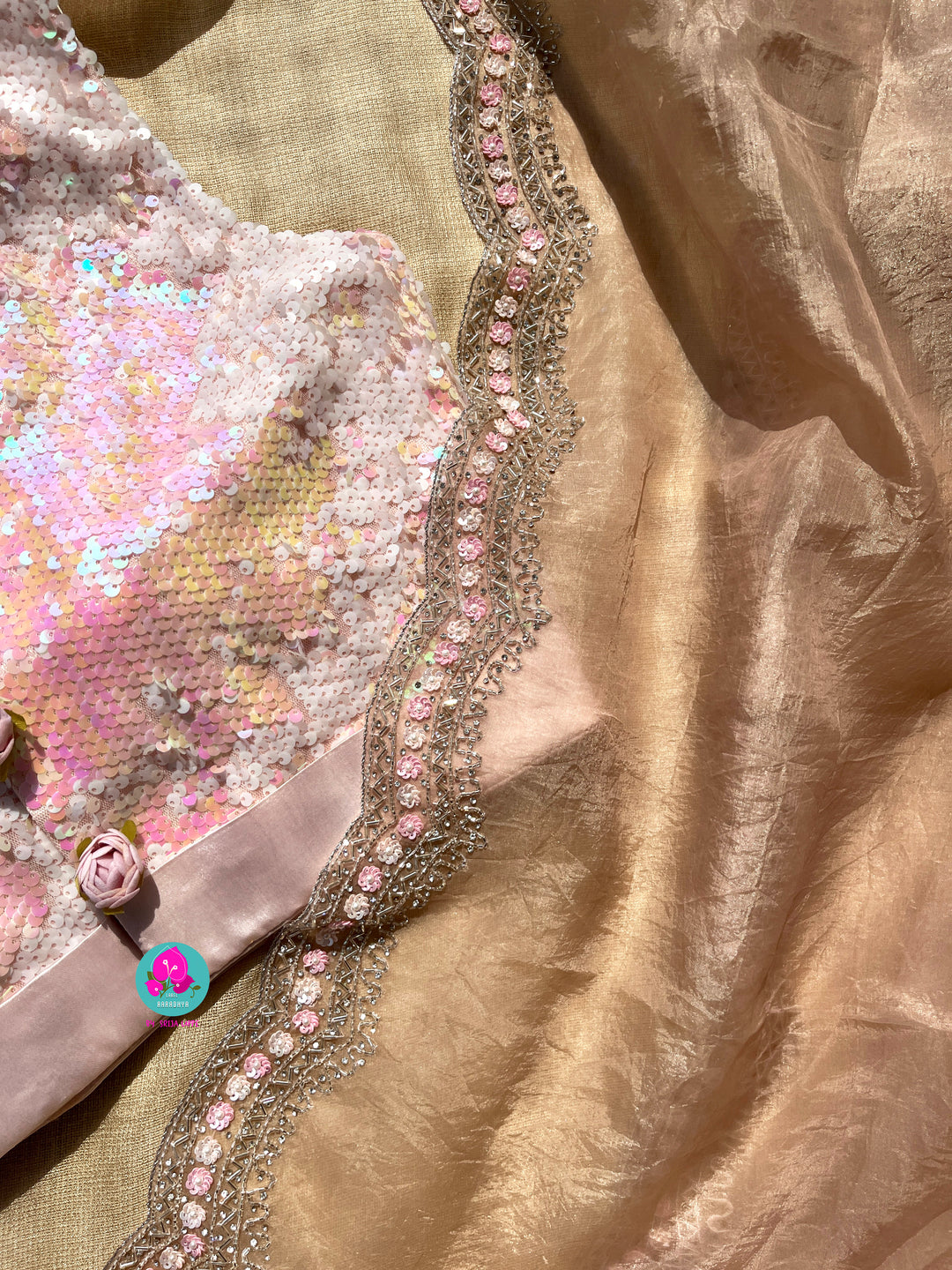 Hand embroidered Organza saree Paired with Sequins blouse